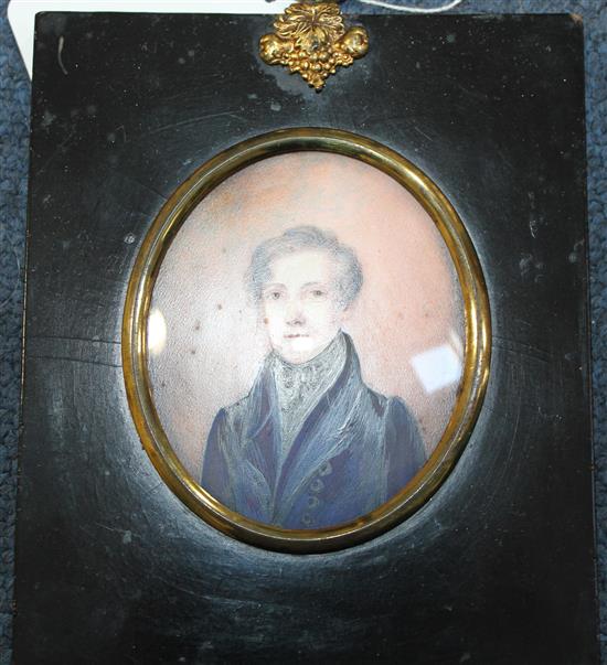 Attributed to Jeremiah Steele (1780-c.1826) Miniature of a young man wearing a blue jacket, 2.75 x 2.25in.